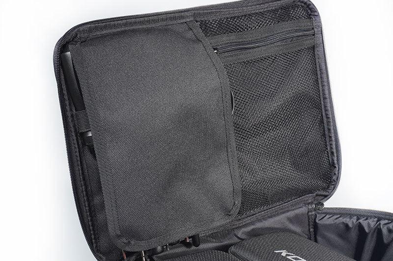 Black RC tool bag open to show mesh pockets and organized storage compartments