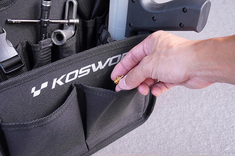 Koswork black RC car pit bag with pockets, holding tools and accessories, product number KOS32236V2-10 visible.