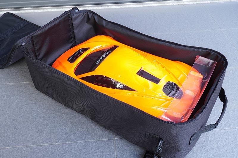 Koswork large black RC car carry bag with zipper, holds orange RC car, KOS32265-4.