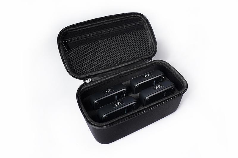 RC car electronic scales in a black zippered carrying case on white background