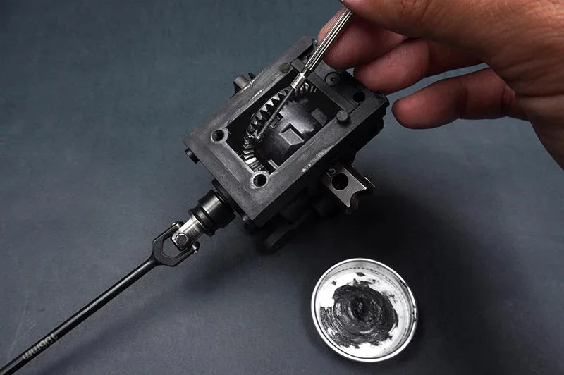 Koswork RC car gear maintenance with lubricant and precision tool, black metal component KOS50008-6