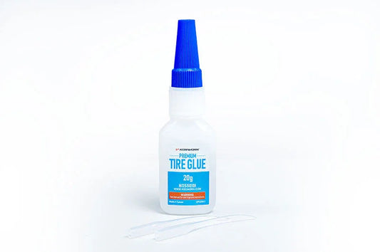 Koswork Premium Tire Glue 20g KOS50101 RC car accessory with blue cap and applicators.