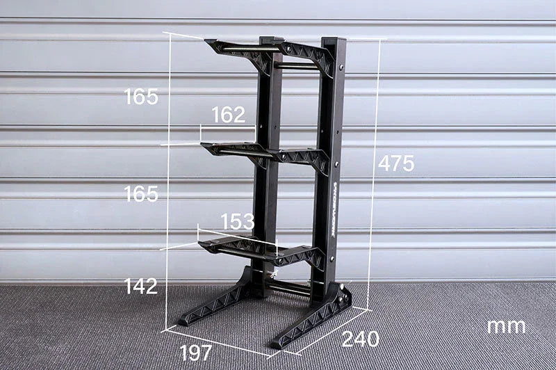 Black RC car stand rack with shelf dimensions labeled in millimeters, displayed indoors.