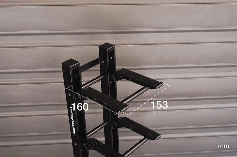 Black RC car pit stand rack with visible measurements 160mm by 153mm against a metal wall