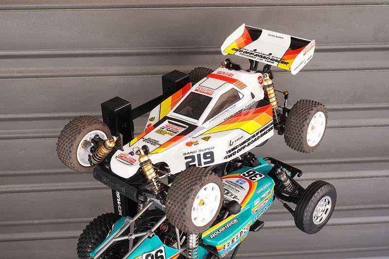 RC buggy cars displayed on a wall mount rack, ideal for RC vehicle storage and organization.